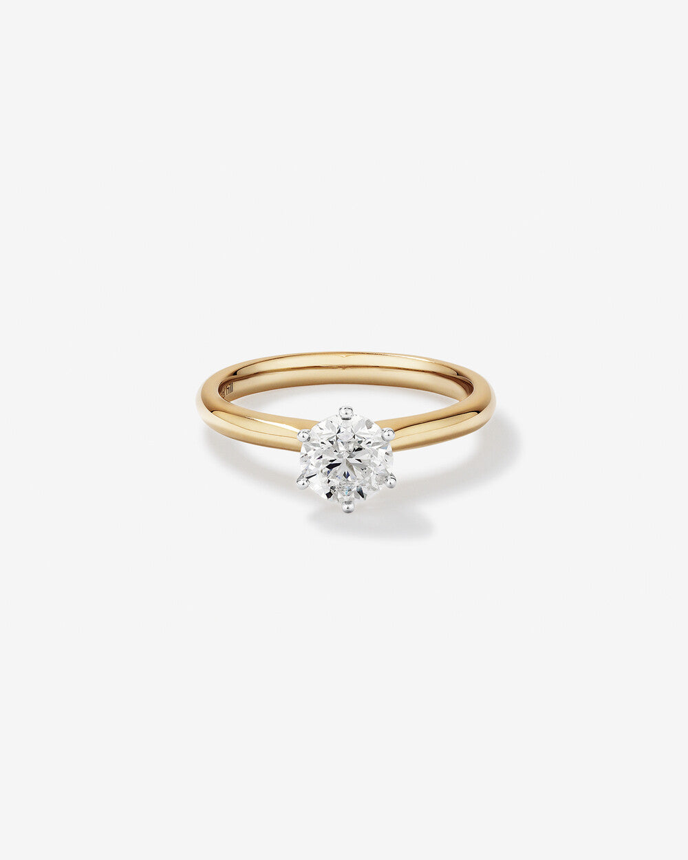 Certified Solitaire Engagement Ring with a 1 Carat Diamond in 18 karat Yellow/White Gold