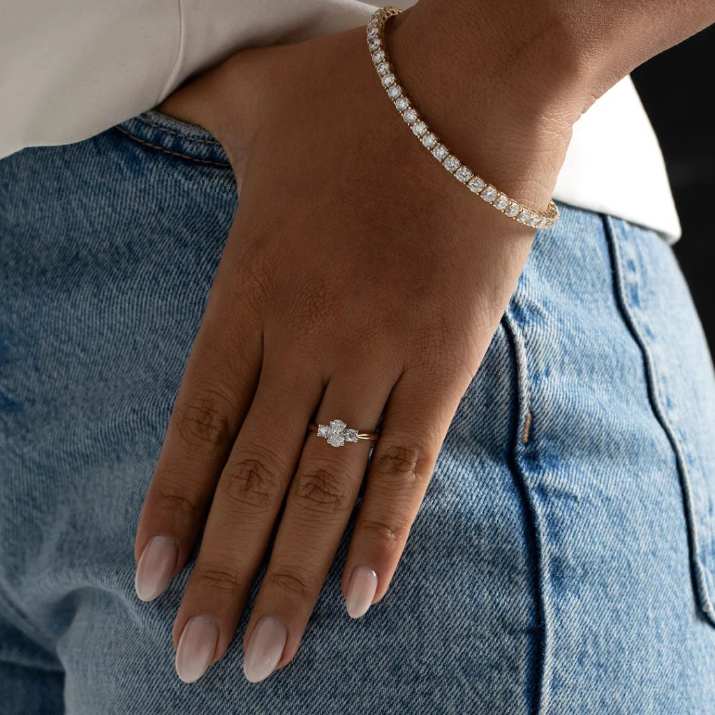 Oval 3-Stone Natural Diamond Engagement Ring in 18 karat Gold