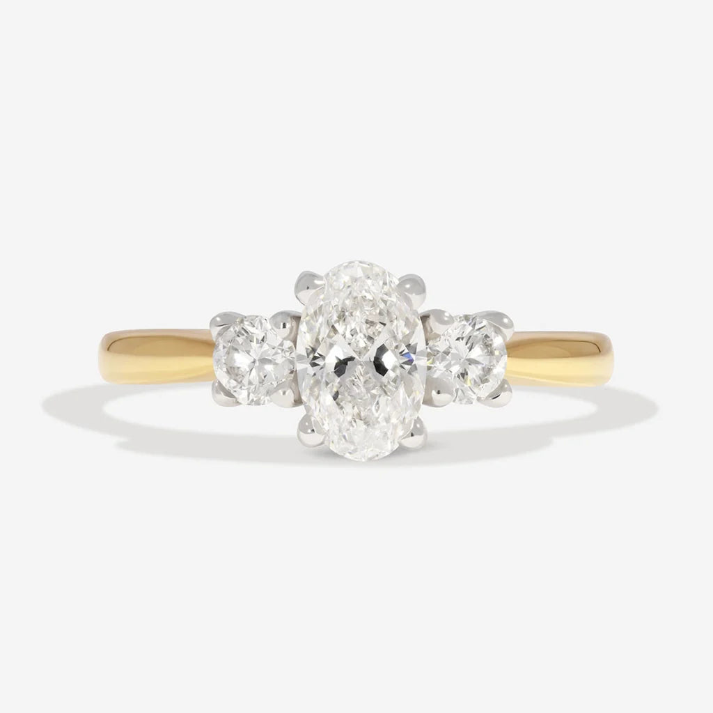 Oval 3-Stone Natural Diamond Engagement Ring in 18 karat Gold